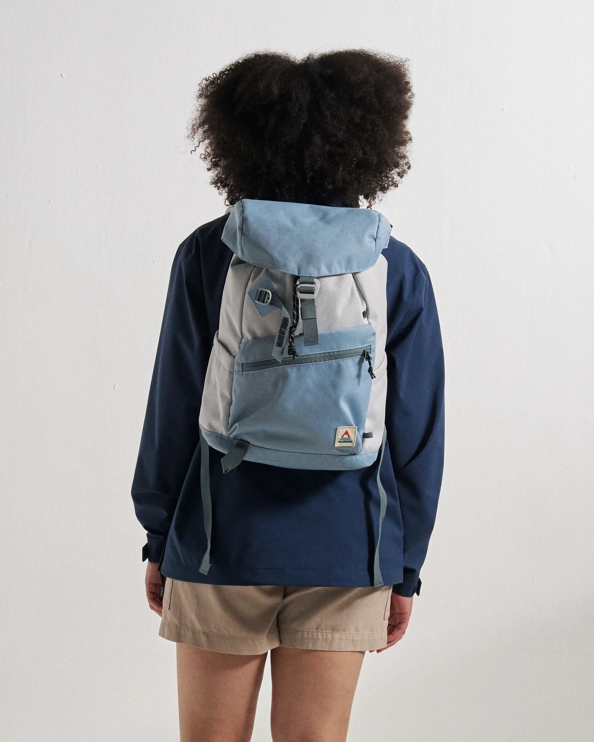 Vantage 18L Backpack - Faded Denim/ Grey Blue - Studio Model - Female