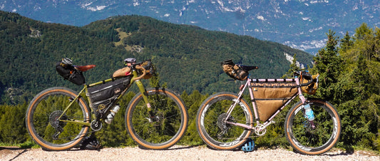 Two bikes on a rocky ledge