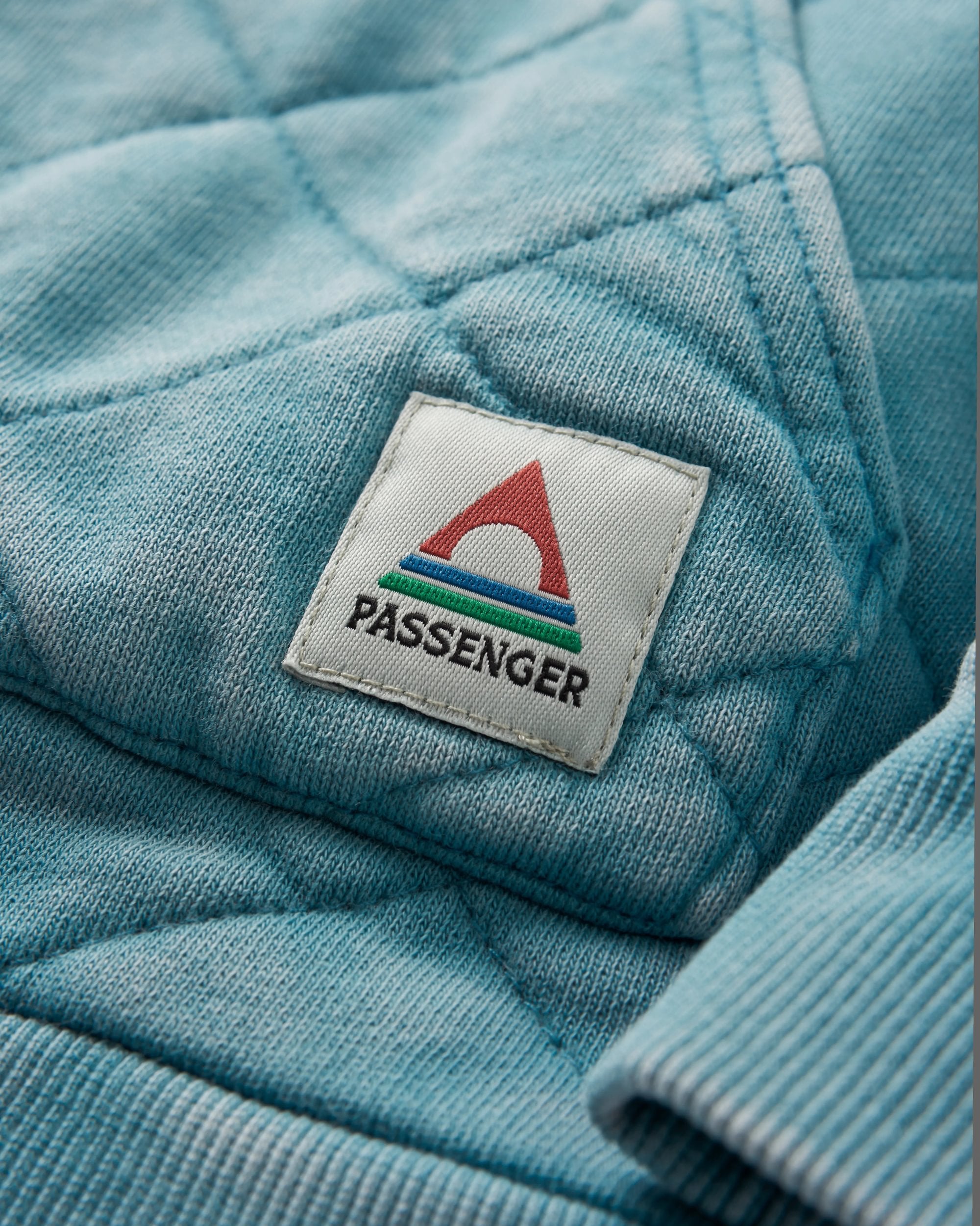 Clementine Recycled Quilted Popper Up Hoodie - Blue Pool - Flatlay