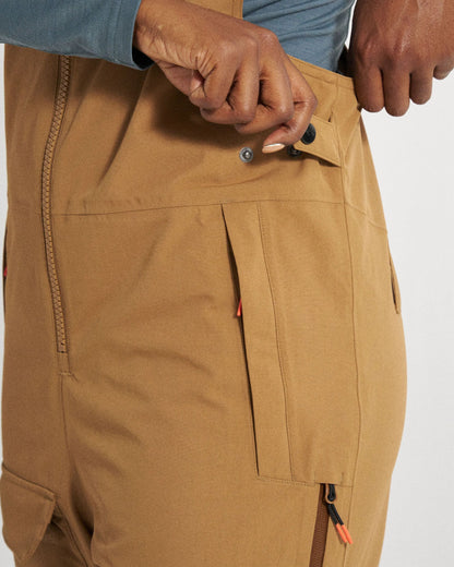 Snowscape Women's Recycled Bibpant - Toffee - Studio Model