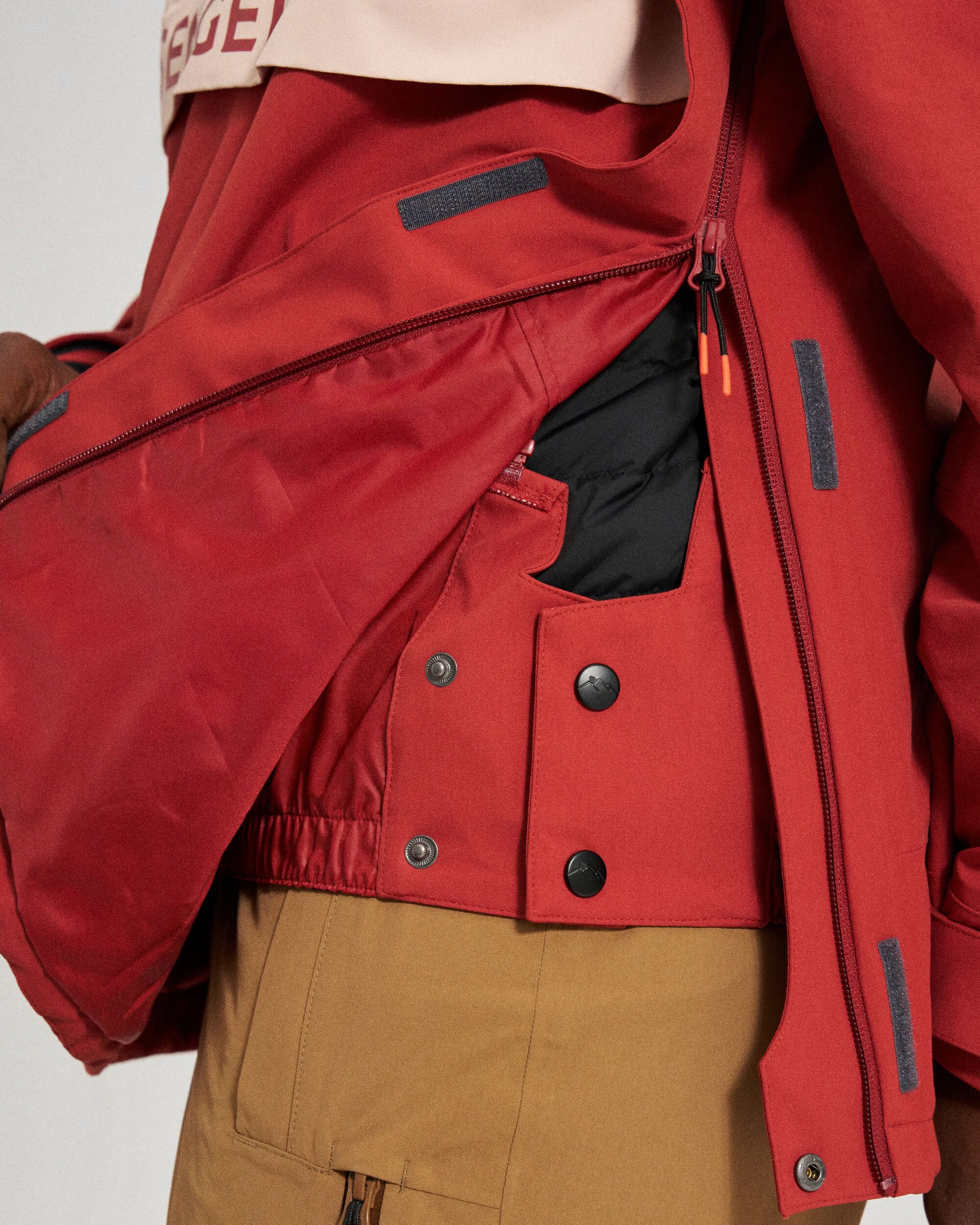 Snowscape Women's Recycled Anorak - Red Ochre - Studio Model