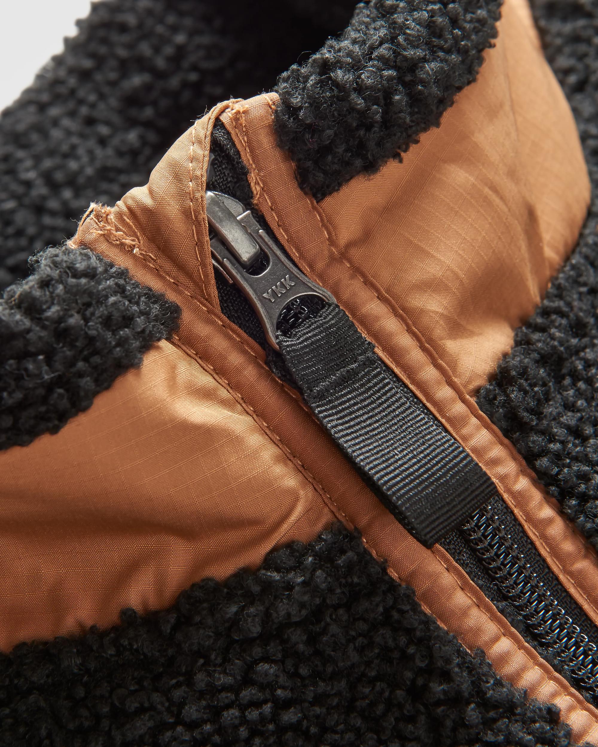 Born Explorer Recycled Polar-Lined Sherpa Vest - Black - Flatlay
