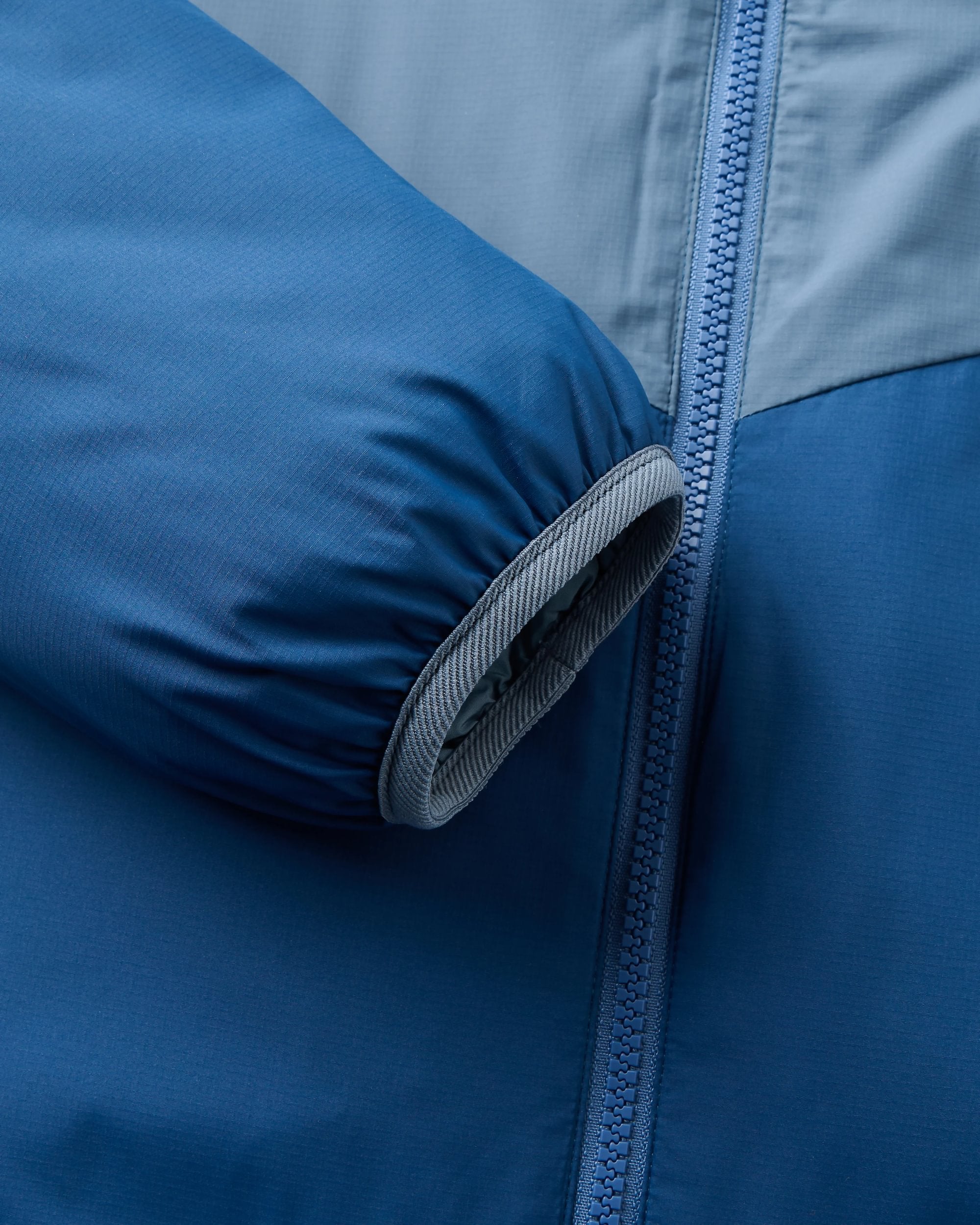 Daybreak Lightweight Recycled Thermore® Hoodless Jacket - Rich Navy/Storm Grey/Dark Denim - Flatlay